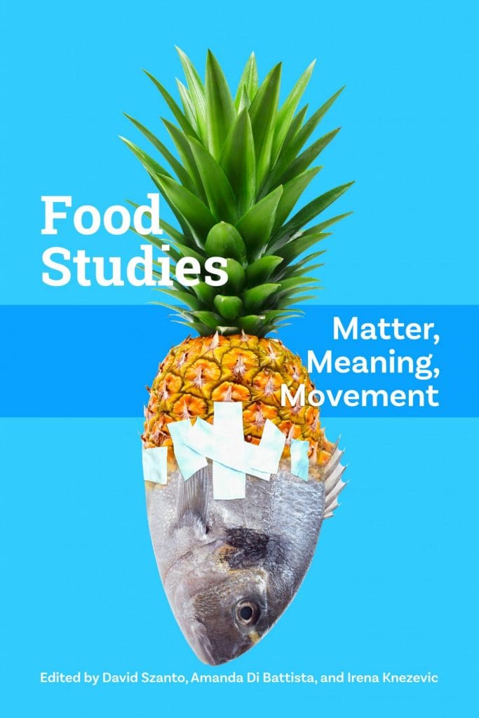 Food studies book cover with a pineapple set against a bright blue background